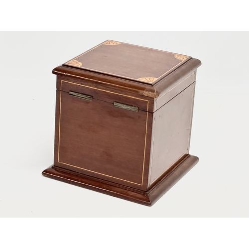 145 - An Edwardian inlaid mahogany tea caddy. 15x15x15cm