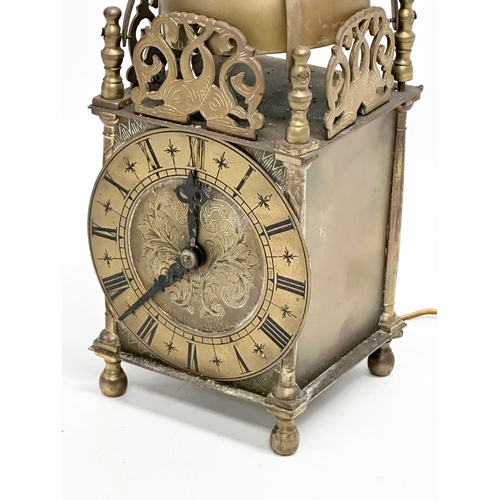 556 - A vintage 17th century style English brass mantle clock by Smiths. 25cm