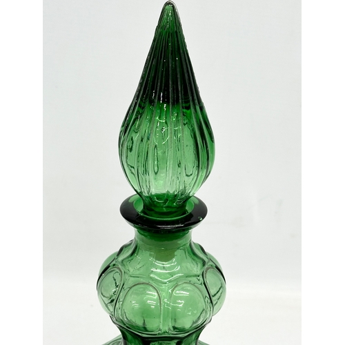 136 - A 1960’s Empoli Italian ‘Genie’ decanter. 37cm