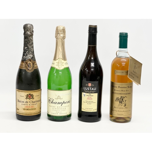 540 - 4 bottles of alcohol. 2 bottles of champagne and 2 bottles of wine. Baron De Charmeuil Carte Blanche... 