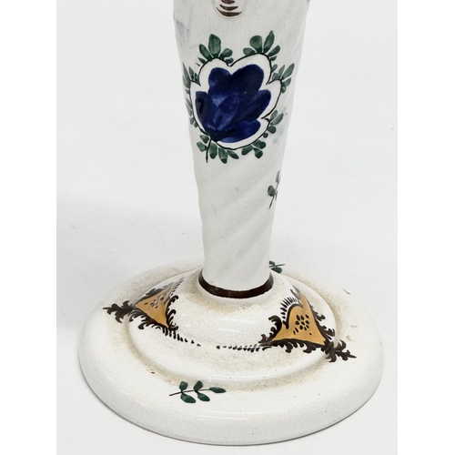 17 - A rare early 20th century Wemyss Ware candlestick. Circa 1900. Impressed mark. 24.5cm