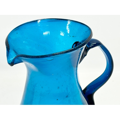 18 - A large late 18th century hand blown Bristol Blue water jug. Circa 1760-1800. 17x14x22cm