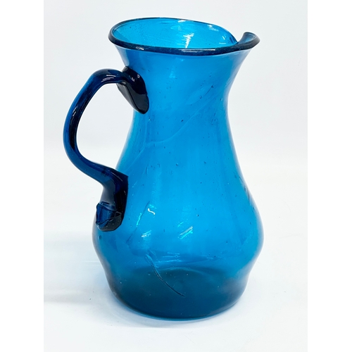 18 - A large late 18th century hand blown Bristol Blue water jug. Circa 1760-1800. 17x14x22cm