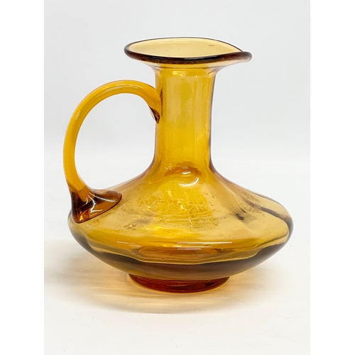 19 - An early 19th century Amber Glass jug. Circa 1800-1830. 17x16x16cm