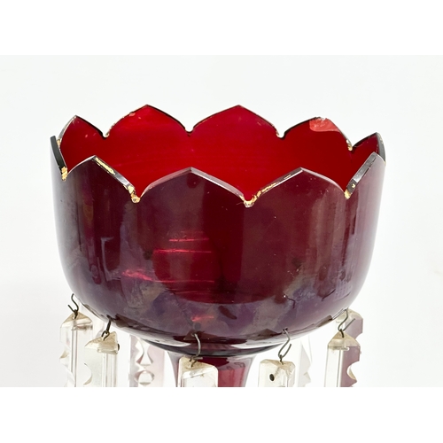 156 - A large Victorian Ruby Glass lustre with cut glass droplets. 16x35cm