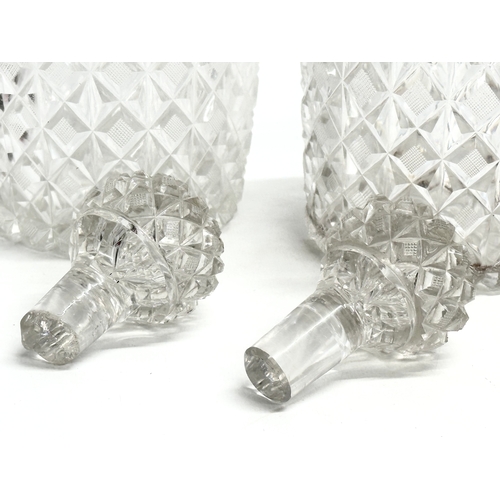 162 - A pair of early 19th century Irish 3 ring glass decanters. Circa 1820-1840. 26cm