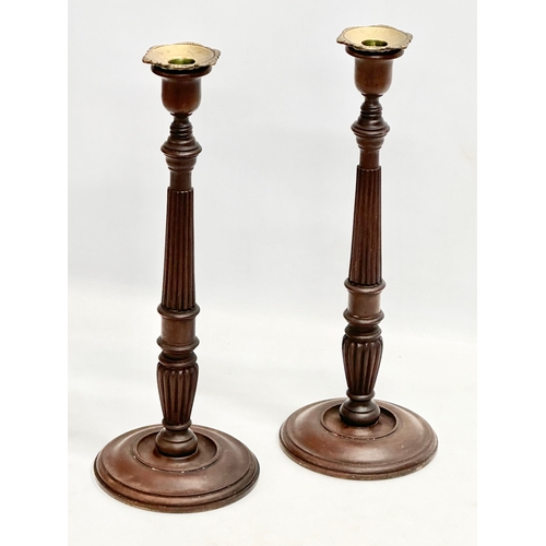 24 - A pair of large excellent quality late 19th century George III style mahogany candlesticks. Circa 18... 