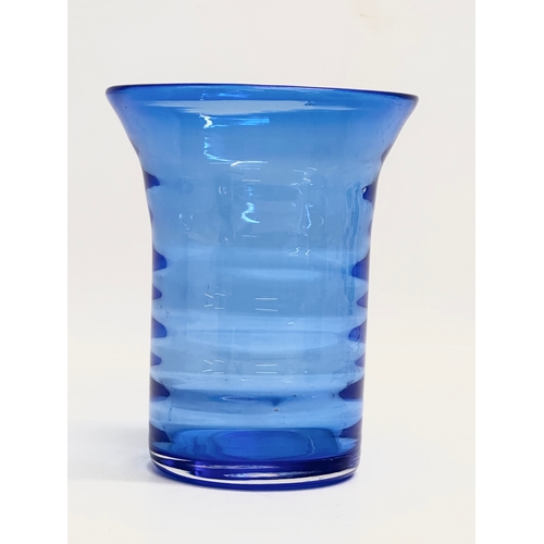 132 - A 1930’s Art Deco blue swirl glass vase. 12x14cm