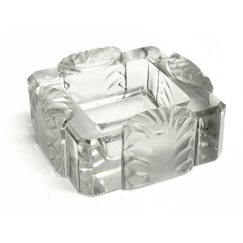 25 - A Lalique Art Deco ‘Corfou’ Crystal cigar ashtray. 11x11x5cm