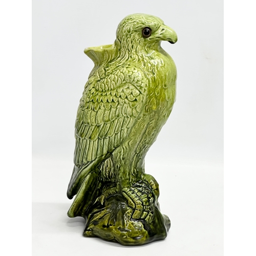 113 - A late 19th century English Majolica hawk spill vase. Circa 1880-1890. 15x29cm