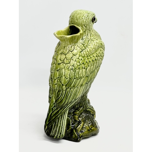 113 - A late 19th century English Majolica hawk spill vase. Circa 1880-1890. 15x29cm