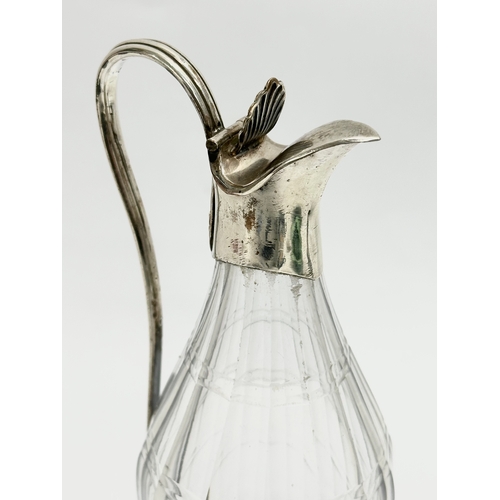 167 - A late George III glass and silver plated vinegar bottle. 20cm