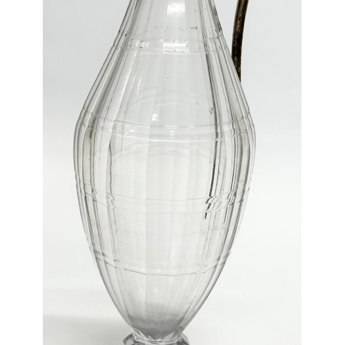 167 - A late George III glass and silver plated vinegar bottle. 20cm