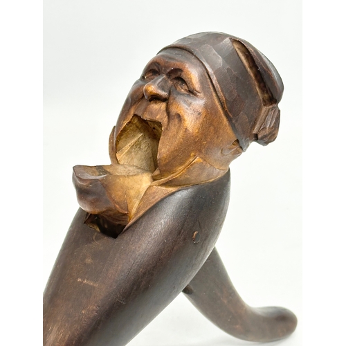 168 - An early 20th century Black Forest nutcracker. A.H.A.B. Circa 1900. 21cm