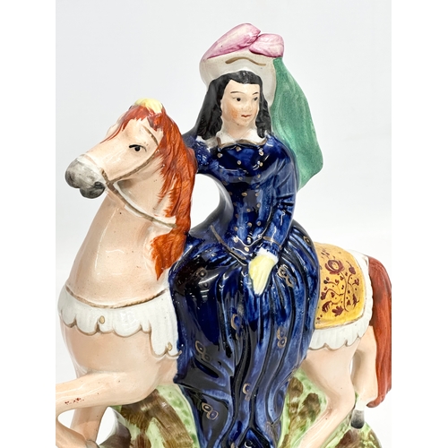 188 - A rare mid 19th century ‘Empress of France’ Staffordshire figurine. 20x24cm