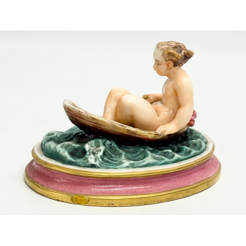 33 - A rare 19th century Royal Worcester Nude Lady Rowing boat figurine. 12.5x10x8.5cm