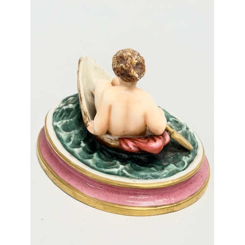 33 - A rare 19th century Royal Worcester Nude Lady Rowing boat figurine. 12.5x10x8.5cm