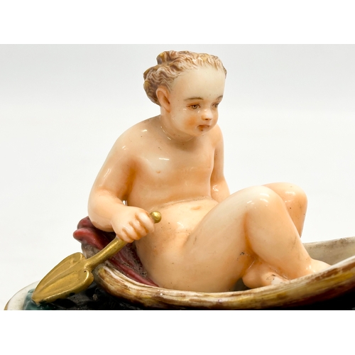 33 - A rare 19th century Royal Worcester Nude Lady Rowing boat figurine. 12.5x10x8.5cm