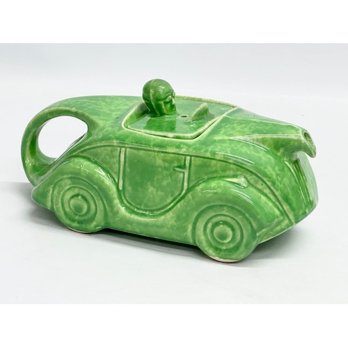 191 - A rare 1930’s James Sadler Art Deco ‘Racing Car’ teapot. 22cm