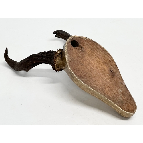 193 - 2 19th century wooden deer skulls. 23cm