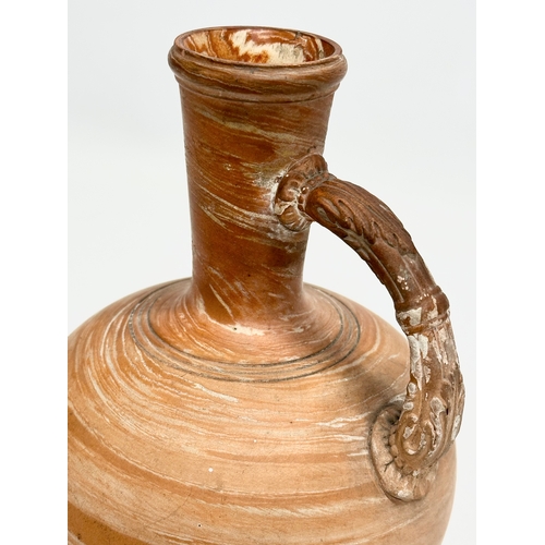 118 - A late 19th/early 20th century Briar Rose terracotta flagon with glazed interior. Impressed mark. 13... 