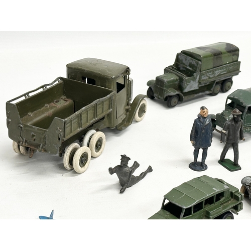 531 - A collection of vintage Britains and Dinky military vehicles and figures.