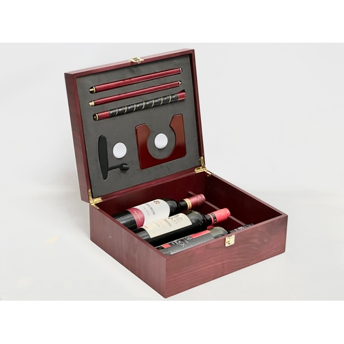 535 - A Wine & Golf gift box. Containing Jacob’s Creek, Calvet Prestige, Black Lebel Red. 36x32x15cm