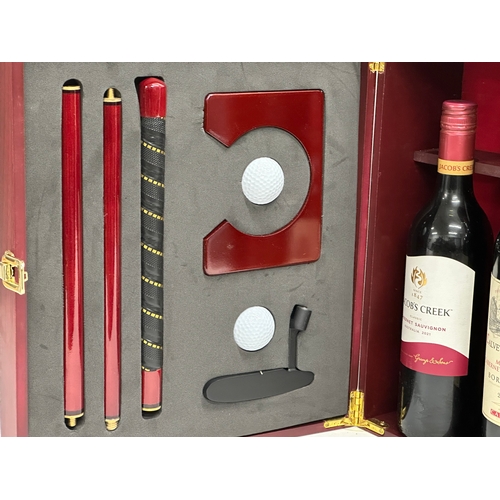 535 - A Wine & Golf gift box. Containing Jacob’s Creek, Calvet Prestige, Black Lebel Red. 36x32x15cm