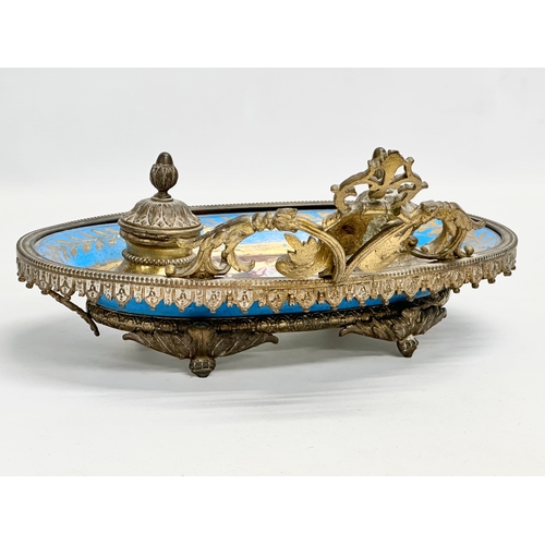 55 - A late 19th century French ornate brass framed inkwell stand with hand painted porcelain bowl. Sevre... 