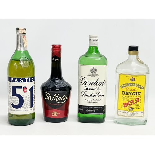 547 - 4 bottles of alcohol. Gordon’s Dry Gin 1L, Silver Top Distilled Dry Gin 1L, Pastis Pernod 51 1L, Tia... 