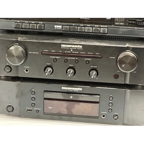 552 - Vintage stereo system. Marantz Integrated Amplifier PM6005. A Marantz CD Plater CD6005. A Kenwood St... 