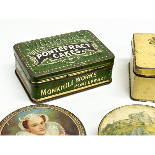 A collection of vintage tins. Wilkinson’s Pontefract Cakes, MacFarlane ...