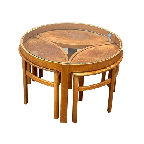 875 - A Mid Century teak ‘Trinity’ coffee table by Nathan Furniture. With 3 nesting tables. 72x51cm 1