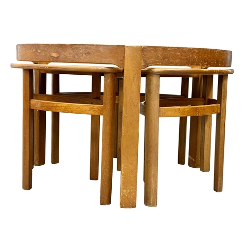 875 - A Mid Century teak ‘Trinity’ coffee table by Nathan Furniture. With 3 nesting tables. 72x51cm 1