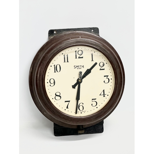 757 - A vintage Smiths Bakelite wall clock. 29x32cm