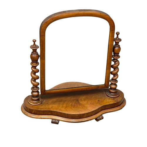 1139 - A Victorian mahogany dressing mirror with Barley Twist pillars. 70x70cm(11)