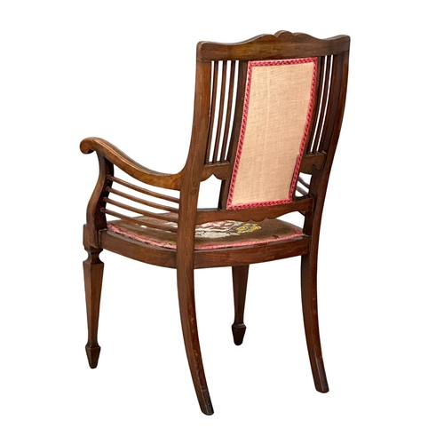 1143 - An Edwardian inlaid mahogany armchair with tapestry seat. 59x53x100cm(12)