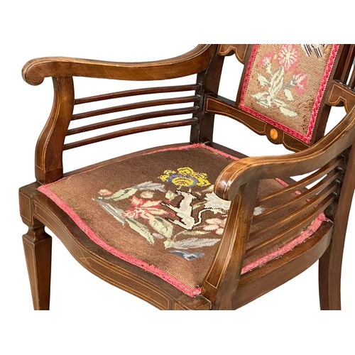 1143 - An Edwardian inlaid mahogany armchair with tapestry seat. 59x53x100cm(12)