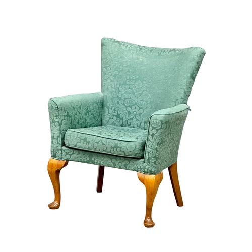 1022 - A mid 20th Century fire side armchair, 63cm x 47cm x 81cm 1