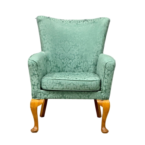 1022 - A mid 20th Century fire side armchair, 63cm x 47cm x 81cm 1