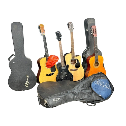 554 - A collection of guitars and cases. Stagg, Action etc.