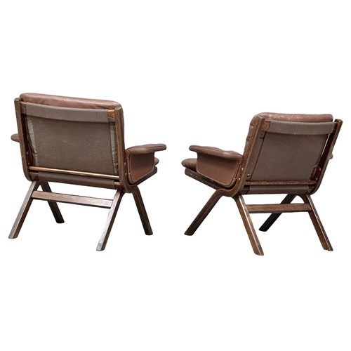 803 - A pair Norwegian Mid Century ‘Uno’ leather armchairs by Ekornes. Possibly designed by Ingmar Relling... 