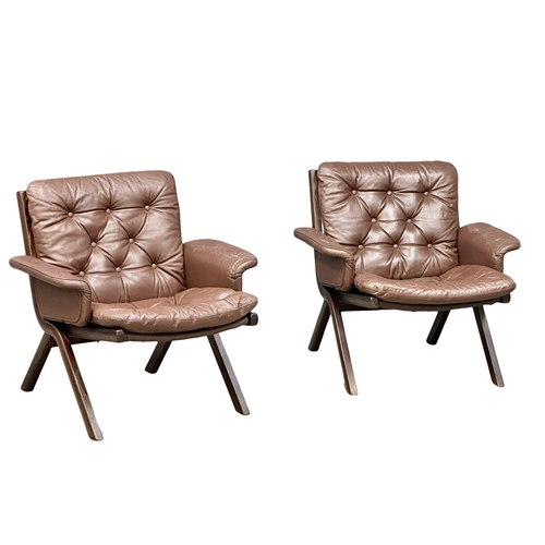 803 - A pair Norwegian Mid Century ‘Uno’ leather armchairs by Ekornes. Possibly designed by Ingmar Relling... 