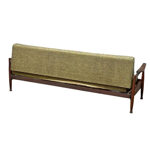 805 - A Mid Century Afromosia ‘Manhattan’ daybed designed by George Fejer for Guy Rogers. 1960’s. 202x81x7... 