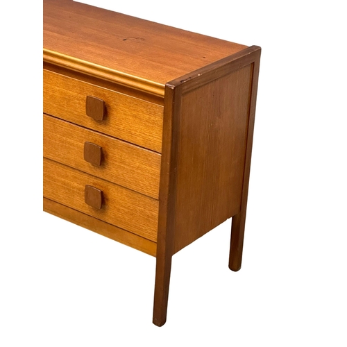 876 - A Mid Century teak sideboard, 183cm x 44cm x 74cm   7