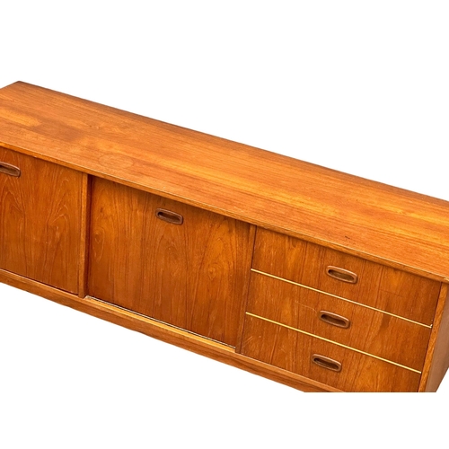 879 - A 1960’s Mid Century teak cocktail sideboard. 152x42.5x72.5cm 6