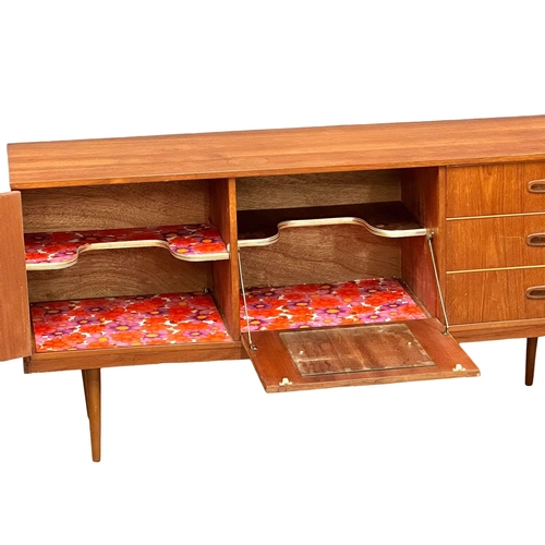 879 - A 1960’s Mid Century teak cocktail sideboard. 152x42.5x72.5cm 6