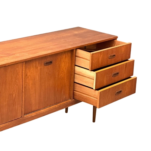 879 - A 1960’s Mid Century teak cocktail sideboard. 152x42.5x72.5cm 6