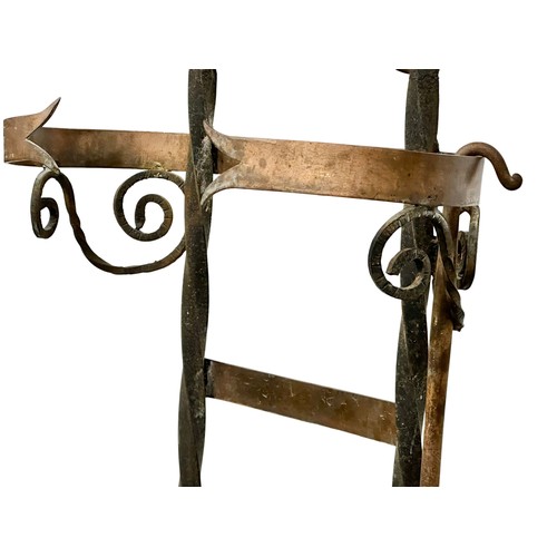 206 - A large late 19th century French Arts & Crafts wrought iron and copper companion set with granite ba... 