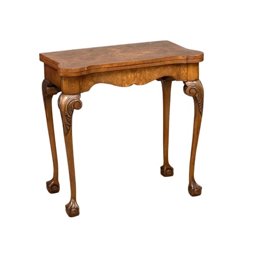 872 - A George III style Burr Walnut turnover games table on ball & claw feet. 76cm x 42cm x 74cm 3